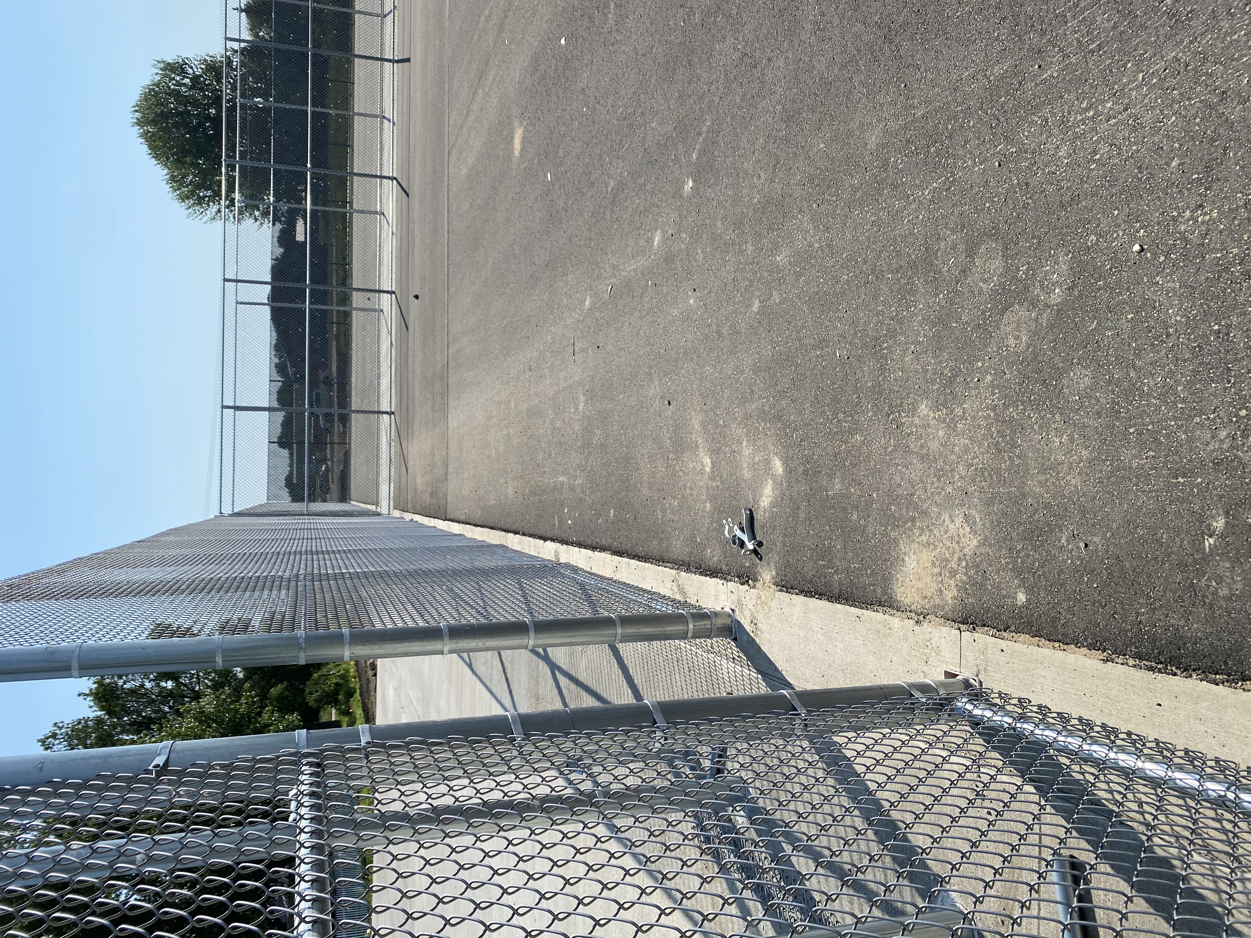 Commercial chain link fence line installation