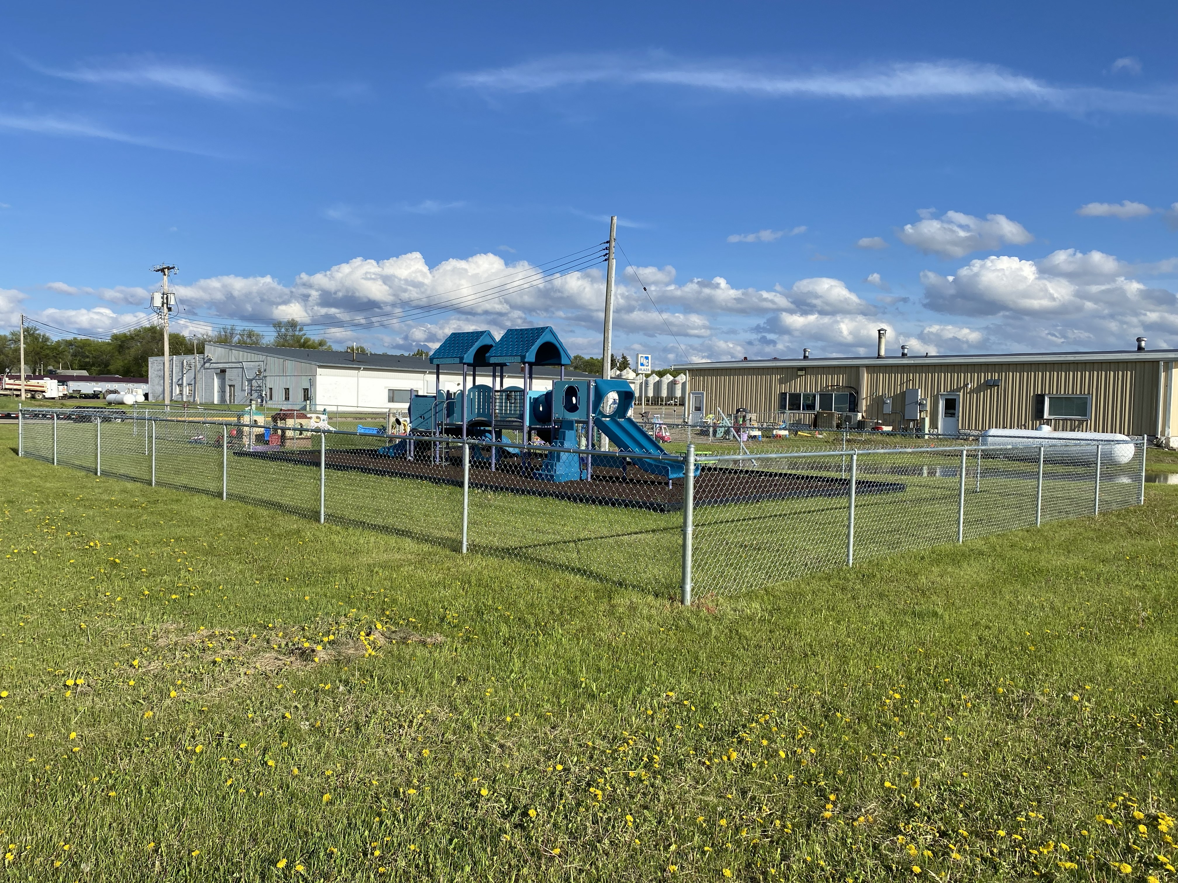 Large fenced playground installation